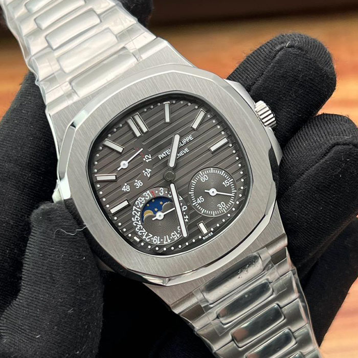 Reloj de lujo estilo Patek Philippe Geneva de 40mm, diseño con movimiento de cuerda, esfera negra multifunción con complicación lunar y acabado en acero inoxidable.