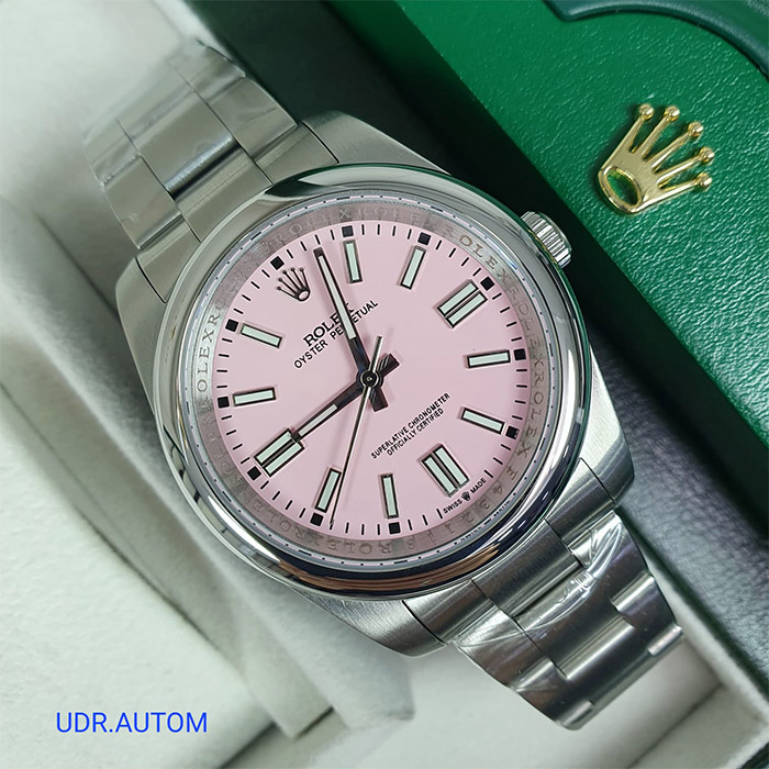 Reloj Rolex Oyster Perpetual con esfera rosa y elegante diseño, brazalete de acero inoxidable, ideal para quienes buscan un estilo sofisticado y práctico para el día a día.