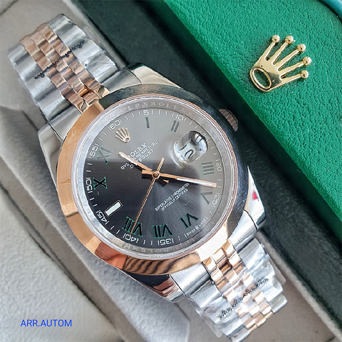 Reloj Rolex Oyster Perpetual Datejust con esfera gris, detalles en oro rosa y brazalete combinado de acero inoxidable y oro, ideal para quienes buscan un reloj elegante y versátil.