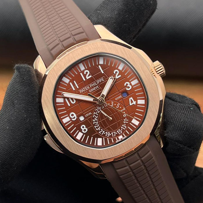 Reloj de lujo estilo Patek Philippe Geneva de 40mm, diseño automático en tono dorado con esfera marrón y correa de silicona marrón.