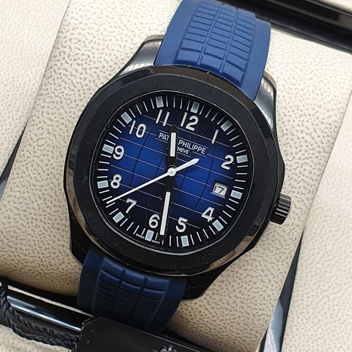 Reloj de lujo estilo Patek Philippe Geneva de 40mm, diseño automático con caja negra, esfera azul y correa de silicona azul.