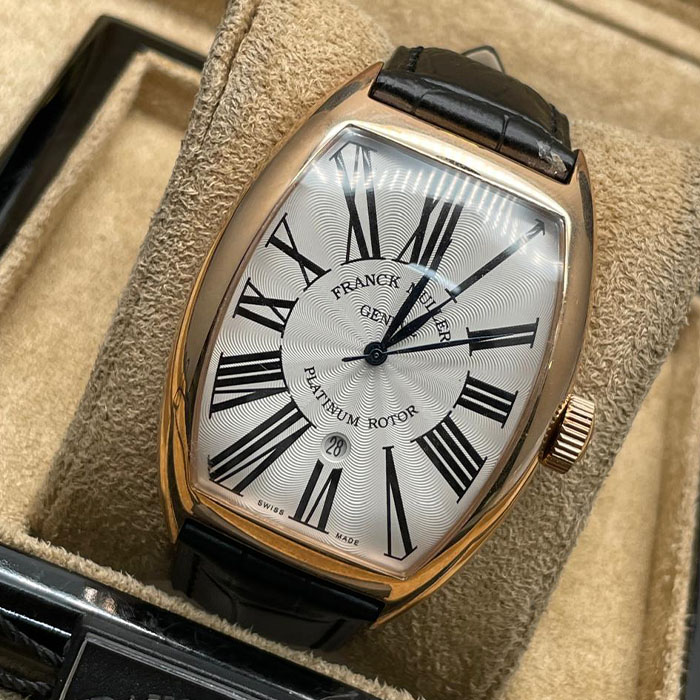 Franck Muller Geneve Platinum Rotor, reloj de lujo con caja de acero inoxidable, esfera plateada y números romanos destacados, diseño elegante.