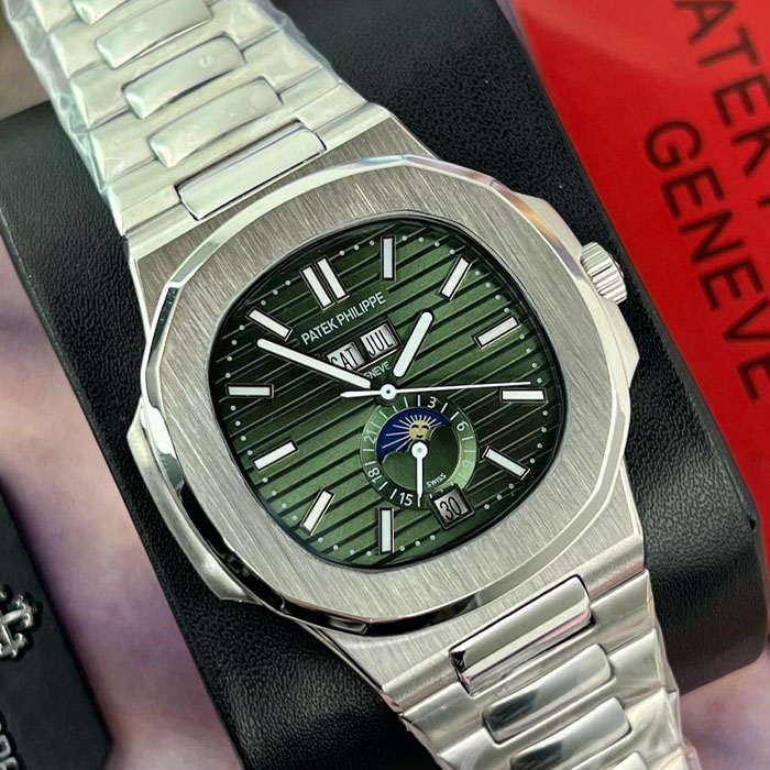 Reloj de lujo estilo Patek Philippe Geneva de 40mm, diseño automático con esfera verde y detalles en acero inoxidable, incluye función de calendario lunar.