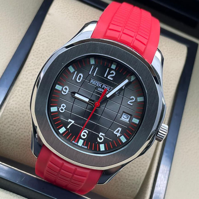 Reloj estilo Patek Philippe Geneva deportivo con correa roja y esfera negra estilizada, ideal para hombres con un estilo casual y dinámico.