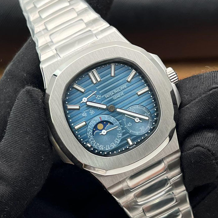 Reloj de lujo estilo Patek Philippe Geneva de 40mm, movimiento de cuerda con esfera azul, acabado en acero inoxidable y función de calendario lunar.