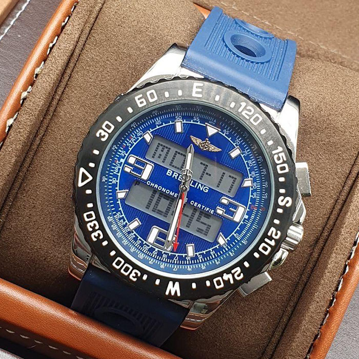 Reloj Breitling Chronometer Certifié con diseño digital y analógico, correa azul y funcionalidad multifunción.